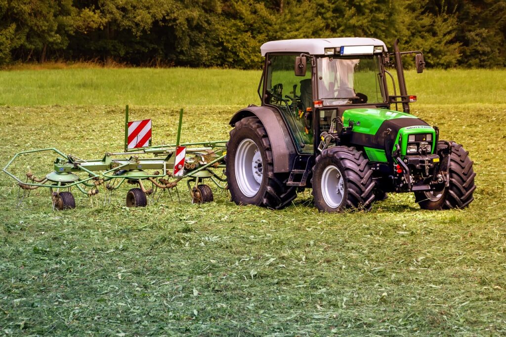 image shows a tractor in a field